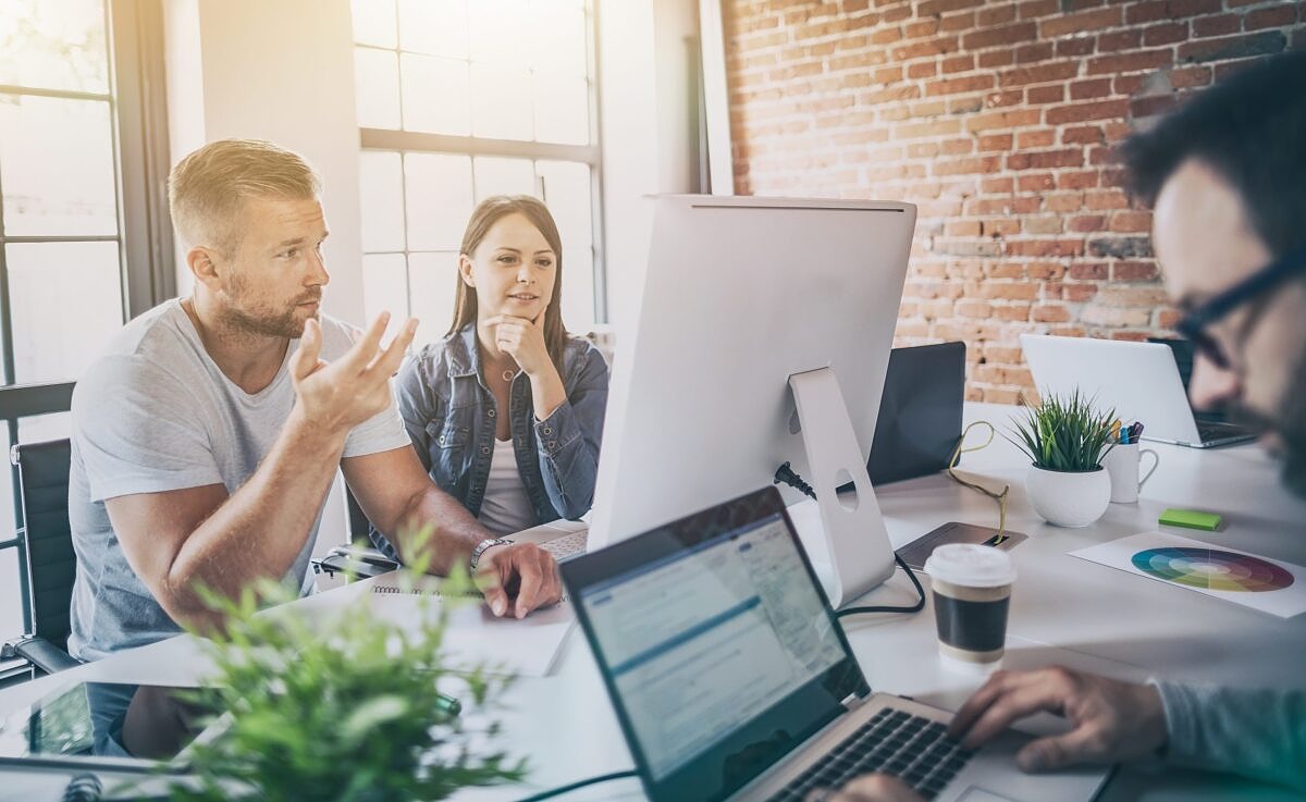 A content team works together to conduct a content audit.