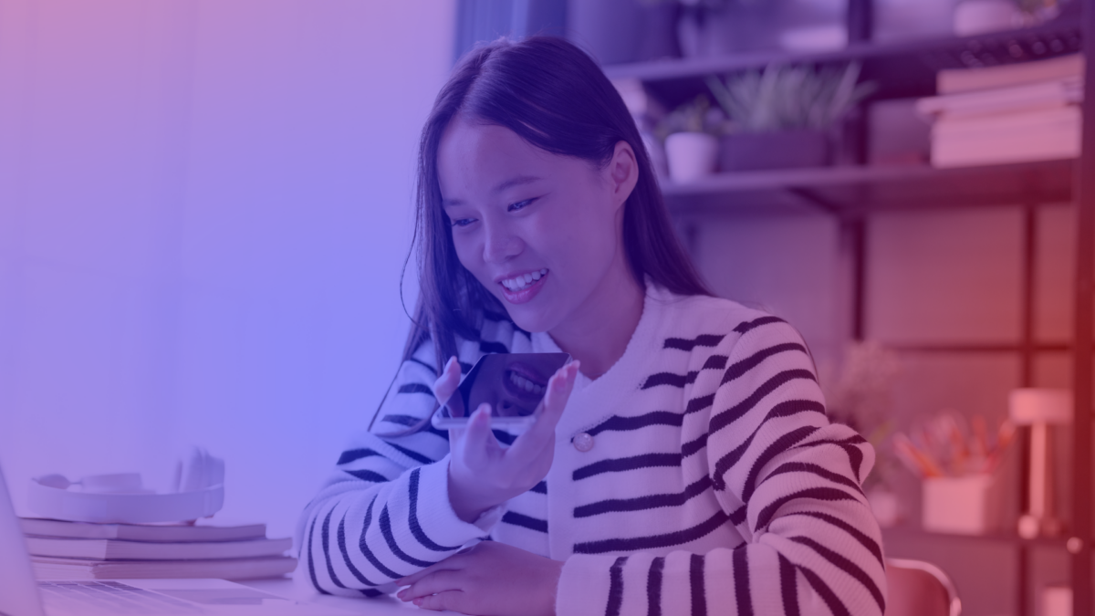 Zero UI enables a woman to use a voice assistant on her smartphone. 