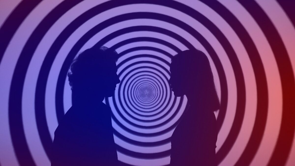 Graphic of two people in front of a hypnotizing swirl.