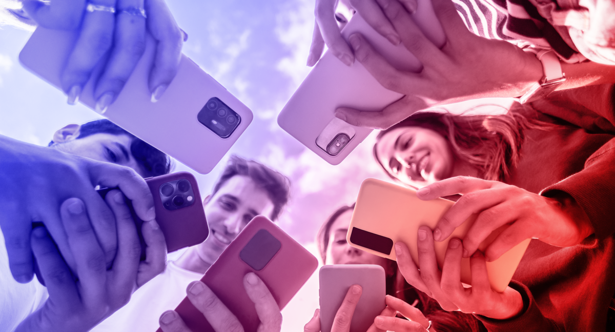 P2P marketing: a group of young people with smartphones in their hands